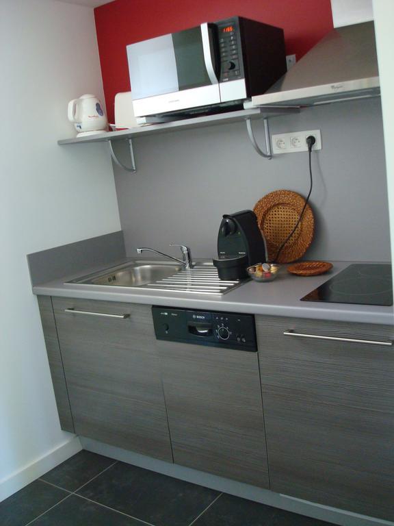 Apartamento Les Communs Du Manoir Écully Habitación foto